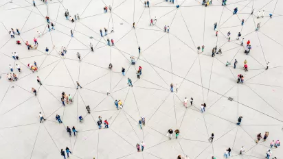 Illustration of an aerial view of people connected by threads