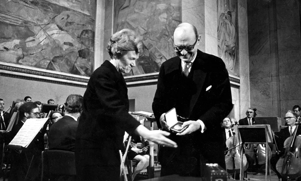 ILO Director-General David A. Morse receives the 1969 Nobel Peace Prize on behalf of the ILO from Aase Lionaes, Chairman of the Nobel Committee of the Norwegian Parliament, Oslo, 1969