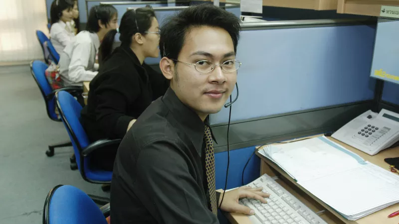 Marcel Crozet/ILO Telephone operators at the Advanced Info Service call centre, Thailand, 2005