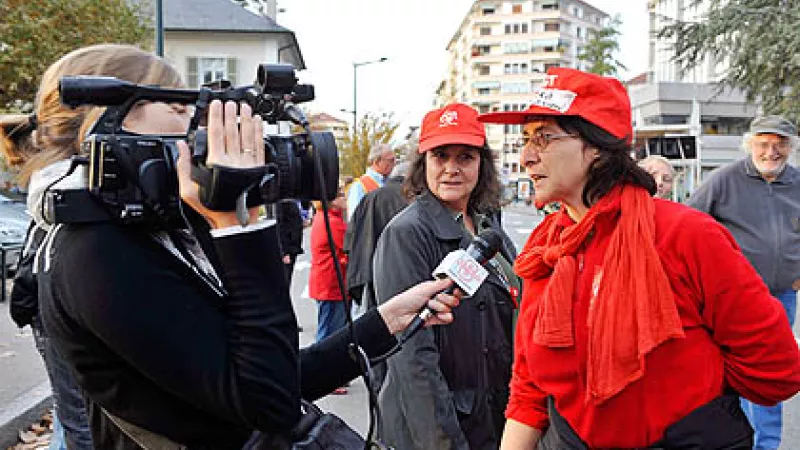 Media coverage of a demonstration by workers and students against pension reform in Annecy, France.