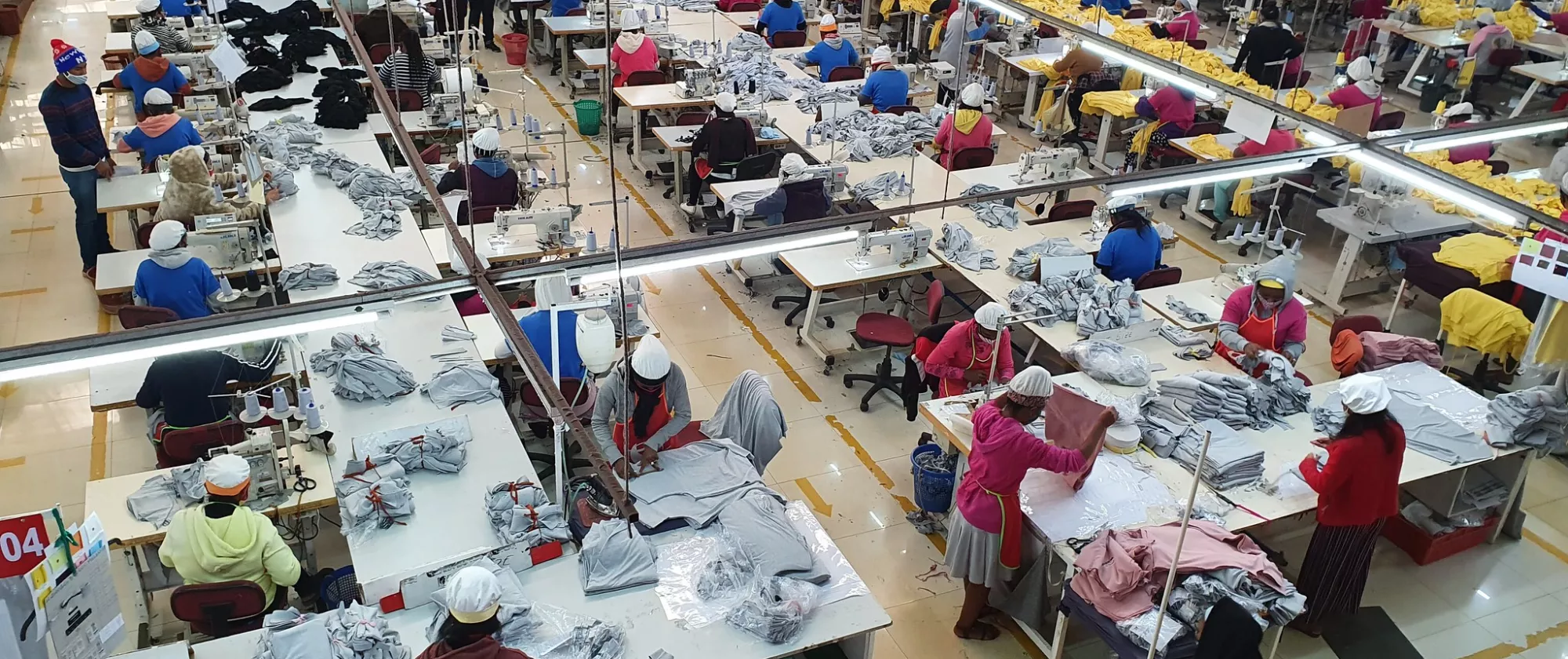 Ariel photo of textile workers in a factory in Madagascar. 